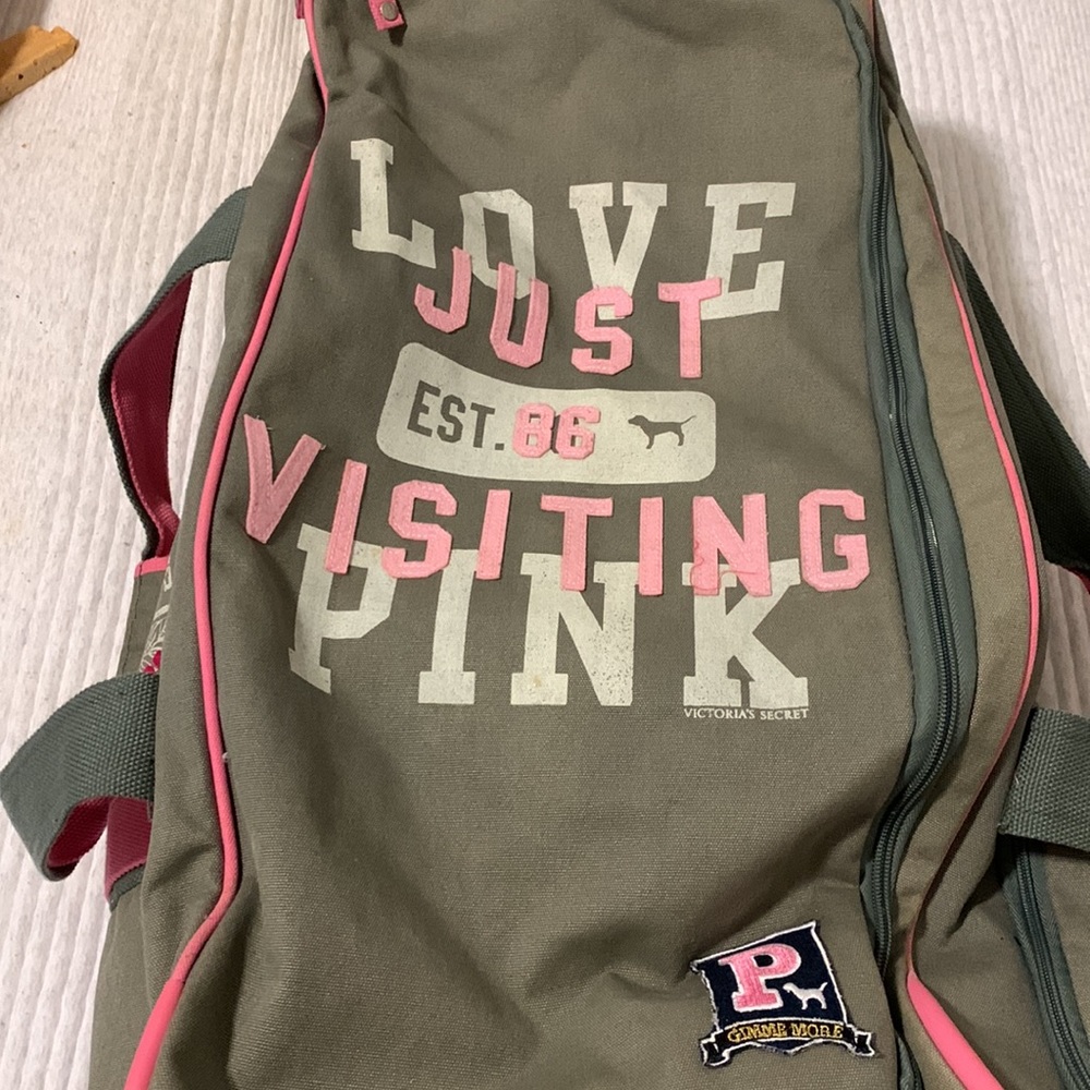 Grey and pink Victoria’s Secret roller duffle